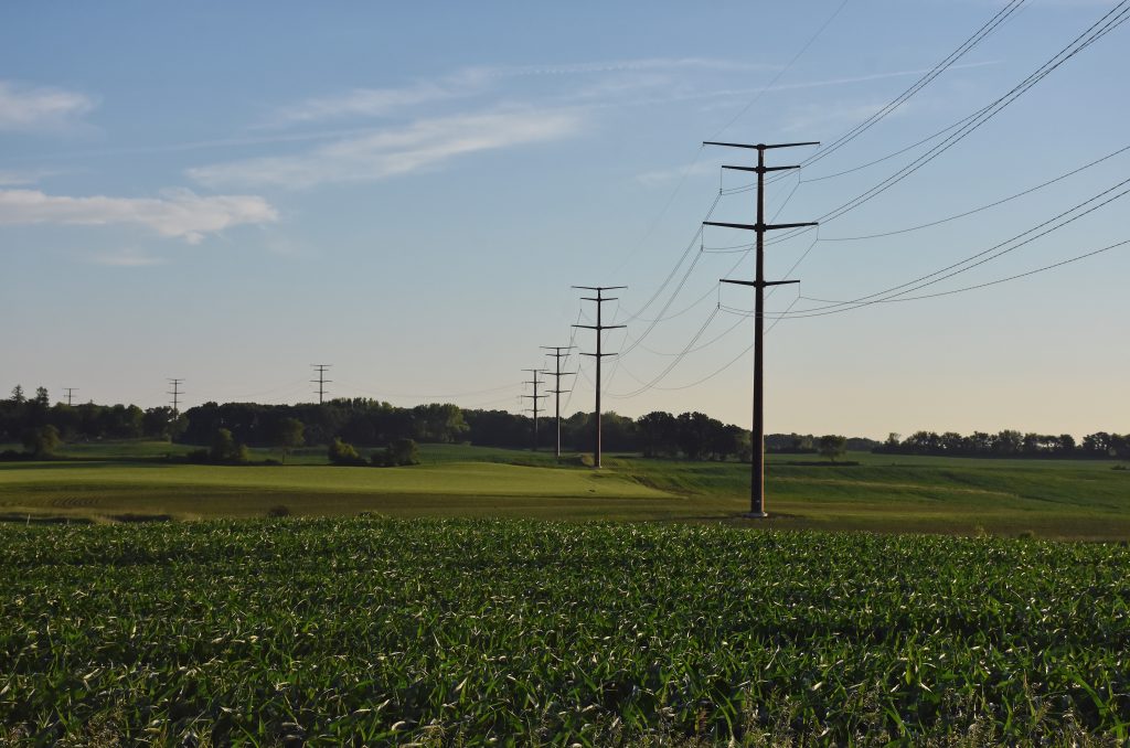 An ITC transmission line moving across the Iowa countryside