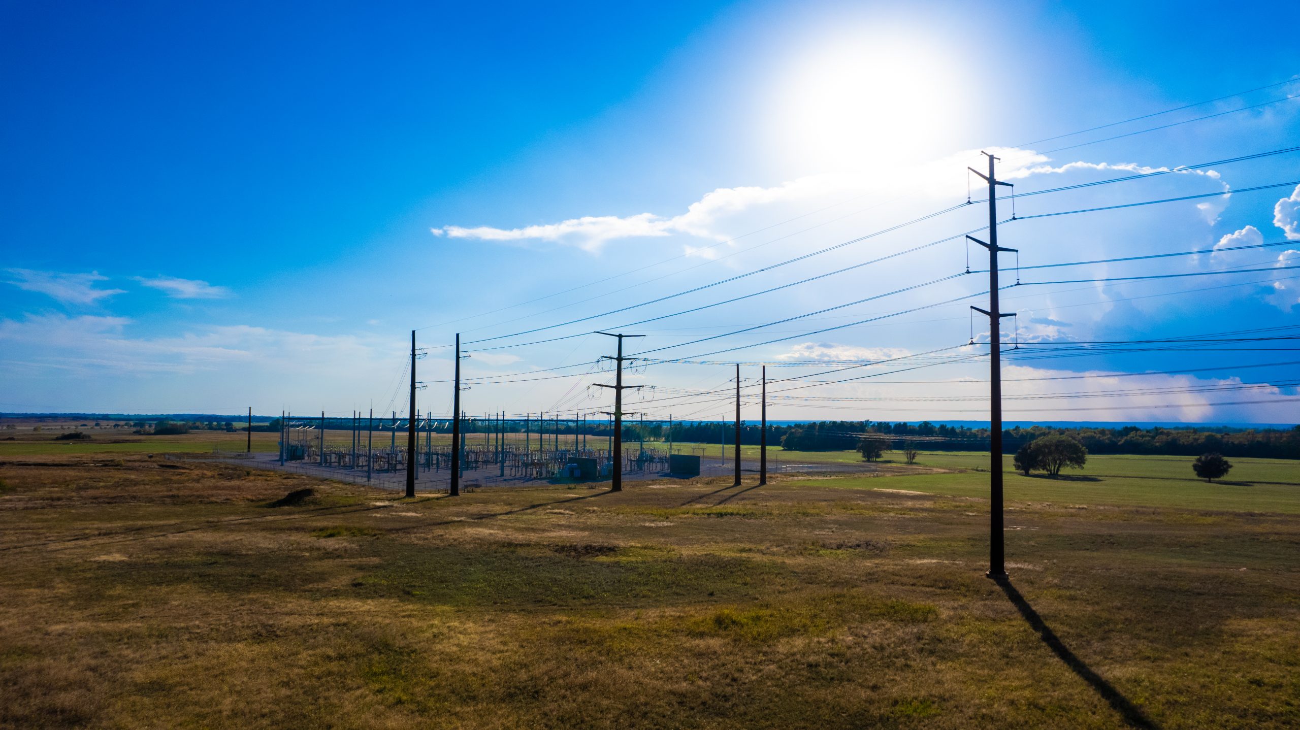 Substation and transmission lines in the great plains.