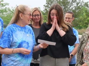 Group of ITC employees presenting a check to the American Cancer Society.