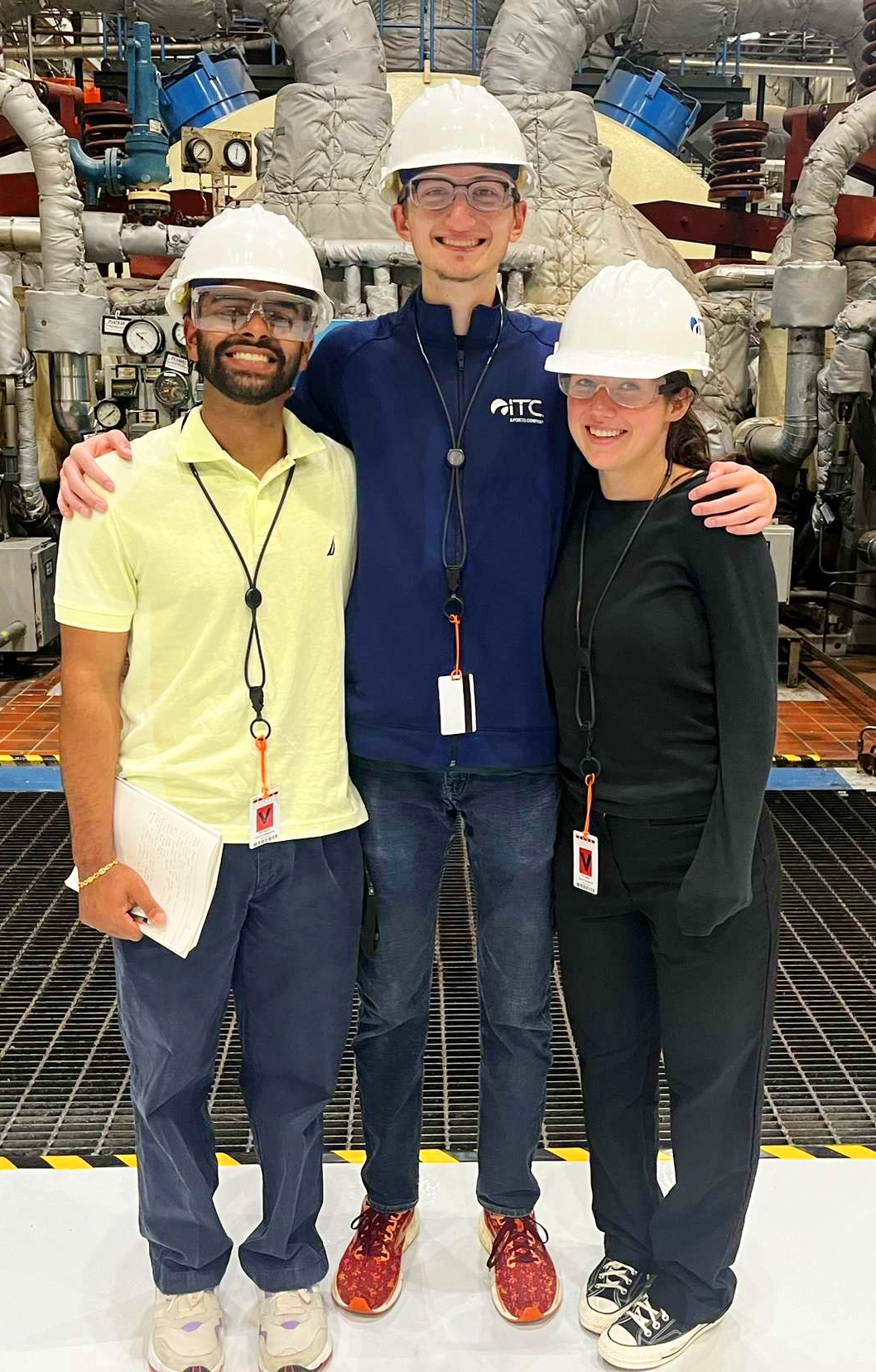 Group of ITC interns inside energy warehouse.