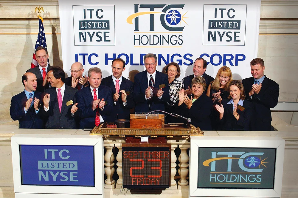 Group of representatives from ITC Holdings Corp. ringing the bell of the NYSE.