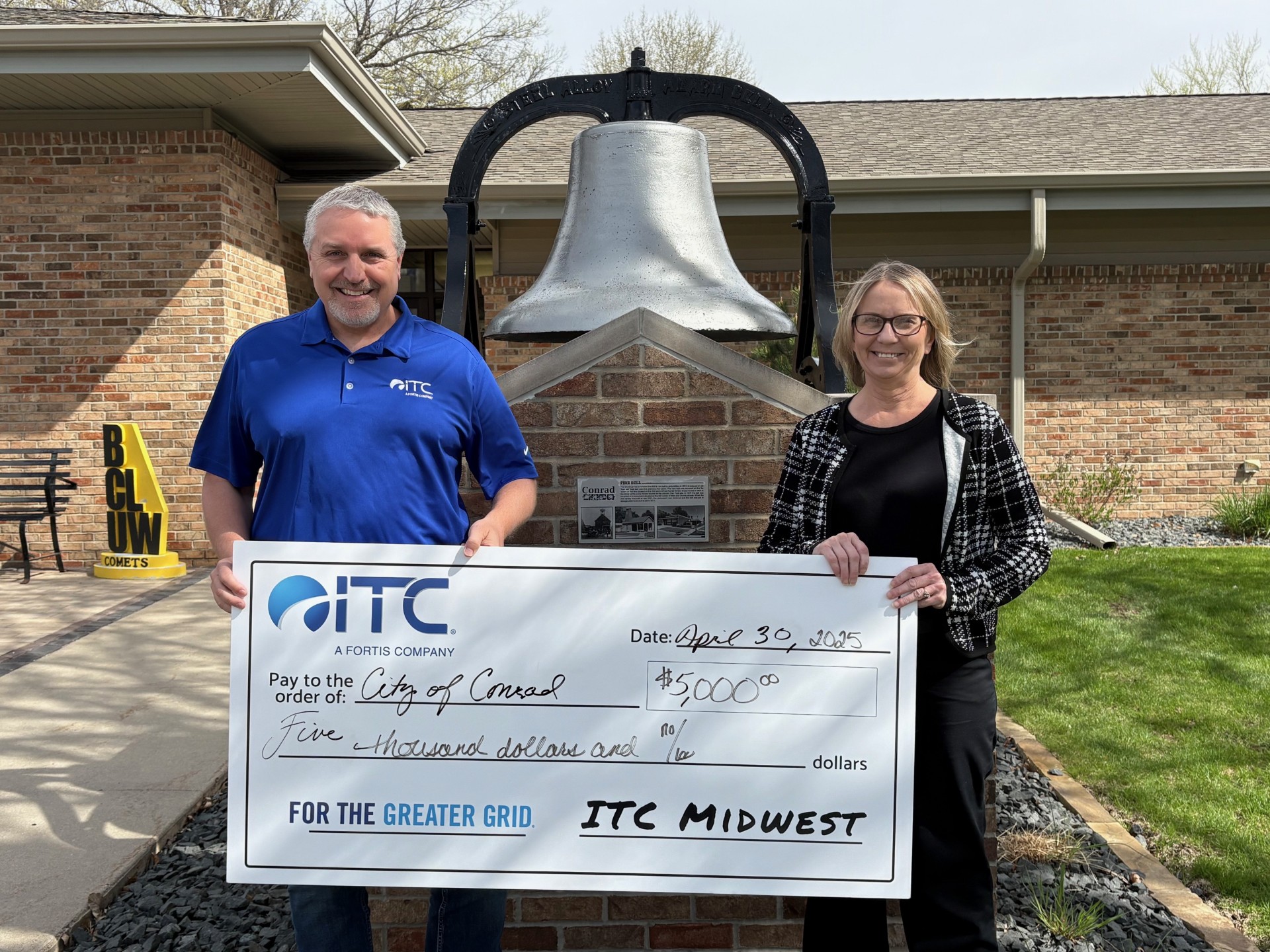 Check presentation to the city of conrad.