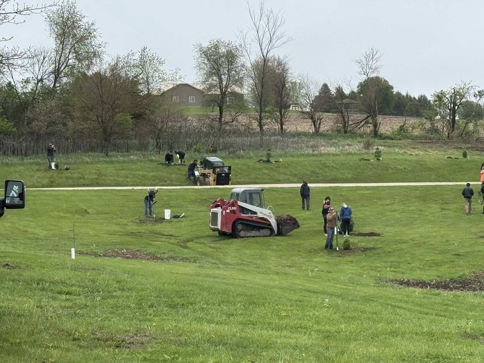 Charity tree planting in Iowa.